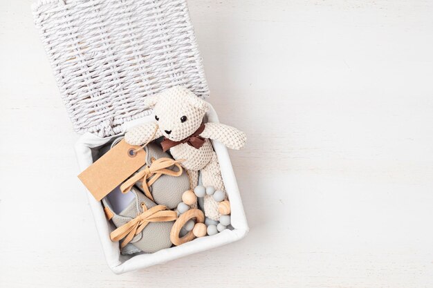 Photo gift basket with gender neutral baby garment and accessories