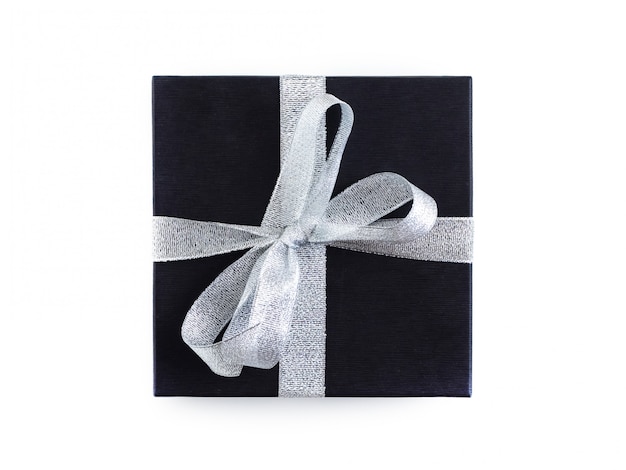 Gift in a black package tied with a silver ribbon.