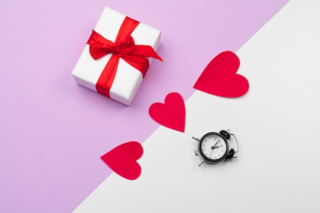 Gift box and paper hearts with copy space, St. Valentine's day composition