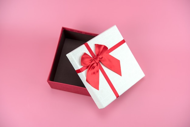 Gift box on pink background