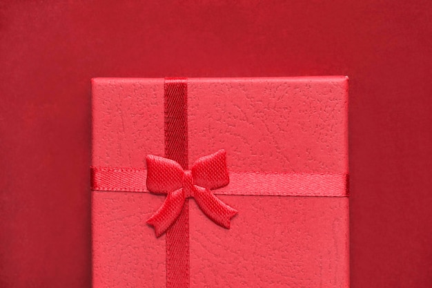 Gift box on red background