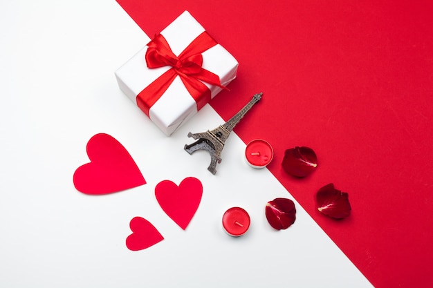 Gift box, red paper hearts . Valentine's Day love. Copy space, flat lay