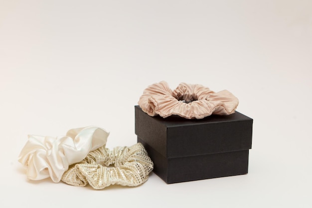 Gift box with beige silk scrunchies lot or hair ties Luxury tools for ladies perfect for all hair