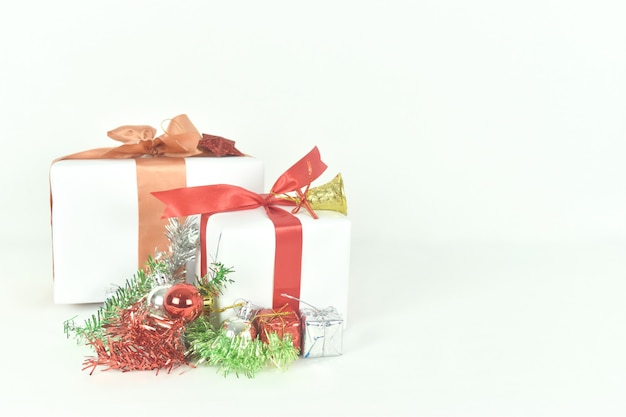 Gift box with decoration christmas accessories on white background