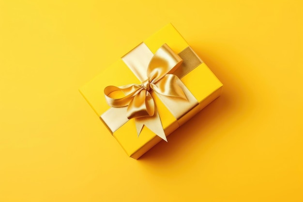 Gift box with golden satin ribbon and bow on yellow background Generative AI