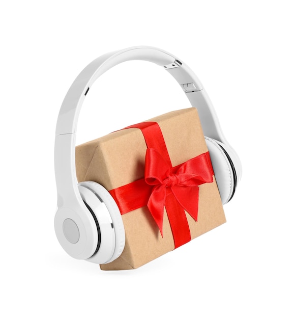 Gift box with headphones isolated on white Christmas music concept