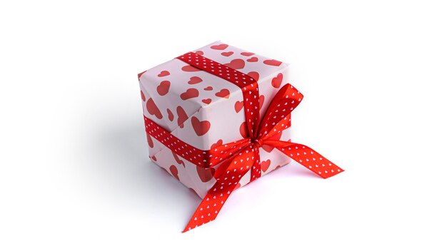 Gift box with red ribbon and hearts isolated on white surface