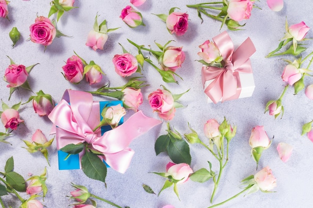 Gift box with satin bow and flowers