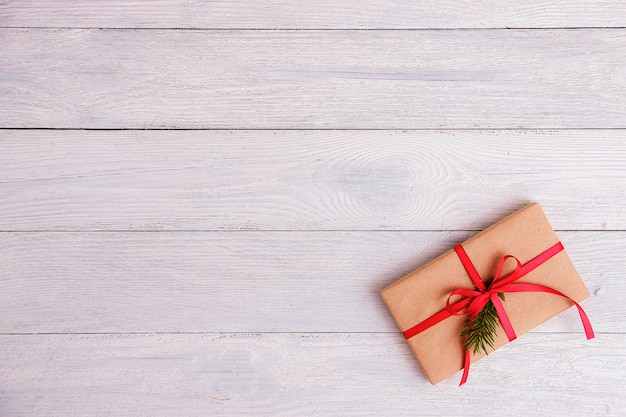 Gift box on wooden table with copy space