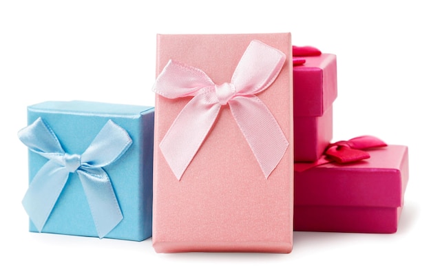 Gift boxes with satin bows on a white background Isolated