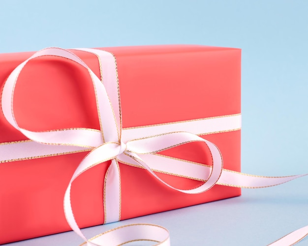 Gift in bright packaging Blue background