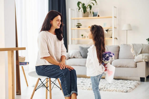 Gift for a mother Woman and her daughter spending time together at home