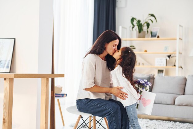 Gift for a mother Woman and her daughter spending time together at home