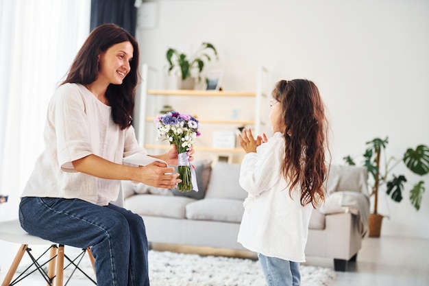 Gift for a mother Woman and her daughter spending time together at home