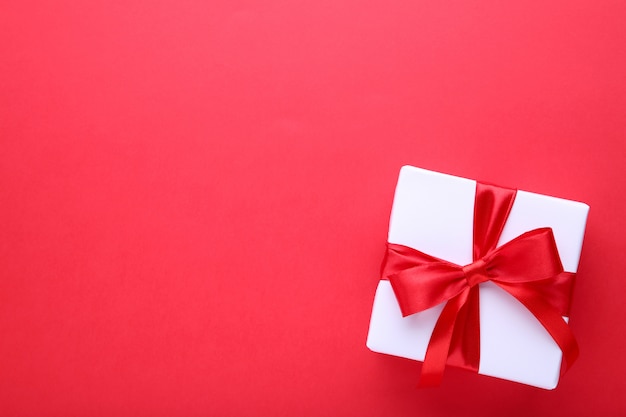 Gift presents box on a red background