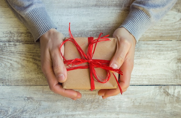 Gift wrapping for the beloved. Selective focus.