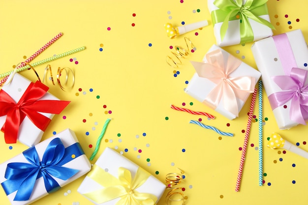 Gifts on a colored background holiday giving presents birthday