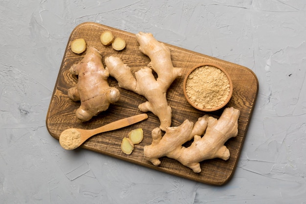 Ginger on Cutting board table top view Space for text