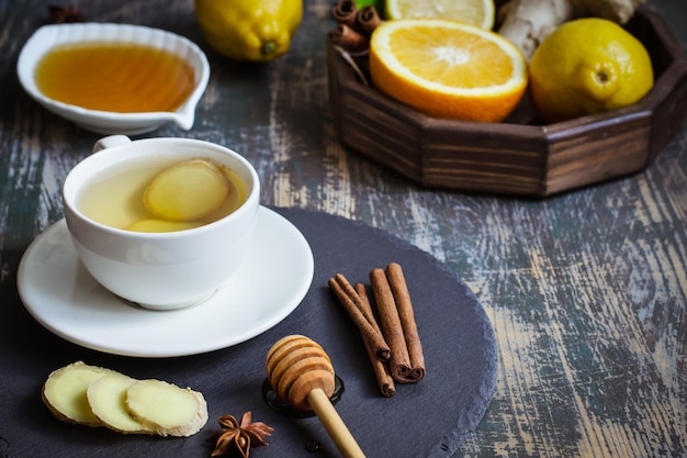 Ginger hot  immunity boosting Vitamin natural drink With citrus, honey and cinnamon and ingredients