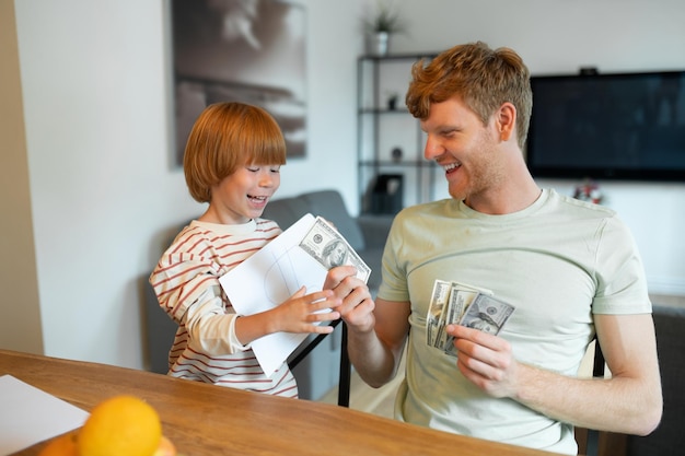 Ginger man and his son spending time together and having fun