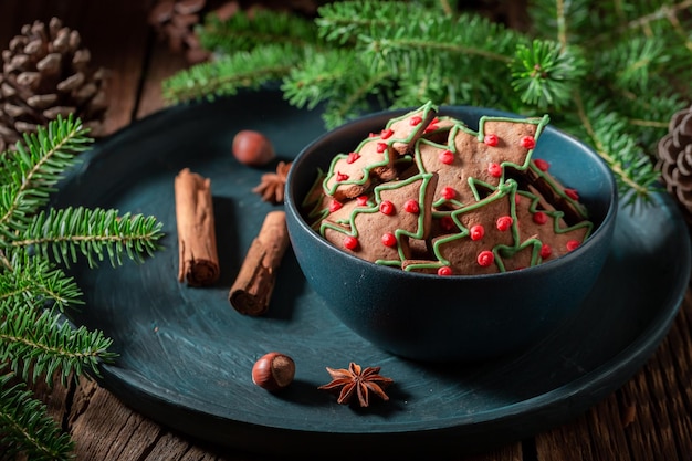 Gingerbread cookies in wooden bowl for Christmas