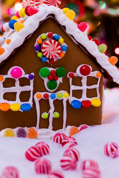 Gingerbread house with round  peppermint candies.