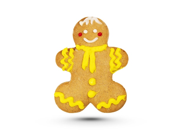 Gingerbread in the shape of man in sugar colored glaze isolated on white background