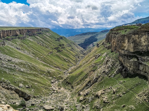 A girl against the background of the Khunzakh valley Khunzakh waterfalls a canyon in Dagestan 2021