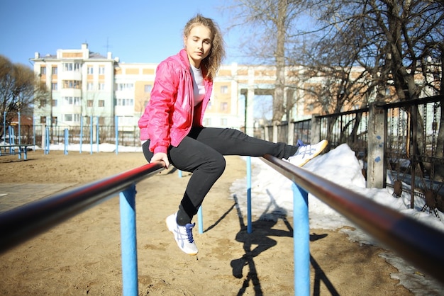 girl athlete gymnastics spring outside