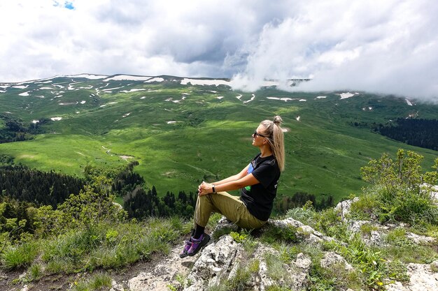 A girl on the background of the LagoNaki plateau in Adygea Russia