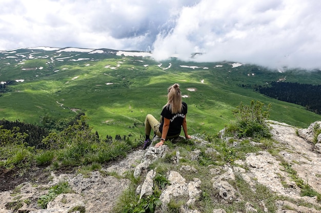 A girl on the background of the LagoNaki plateau in Adygea Russia