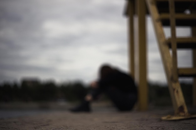 Girl bullying loneliness teenager alone in solitude trying isolation to cope with anger