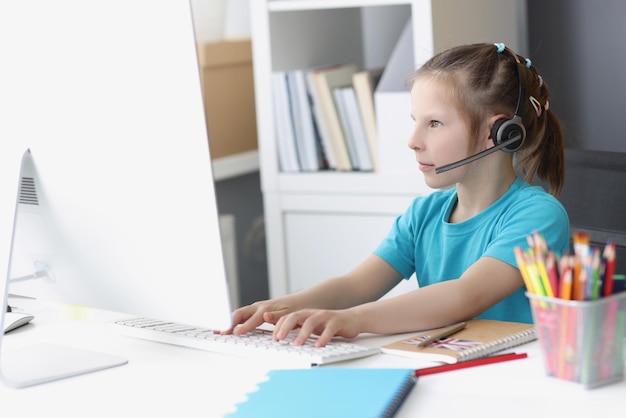 Girl busy with online school classes from home because of pandemic situation