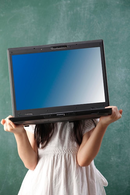 Girl carry laptop