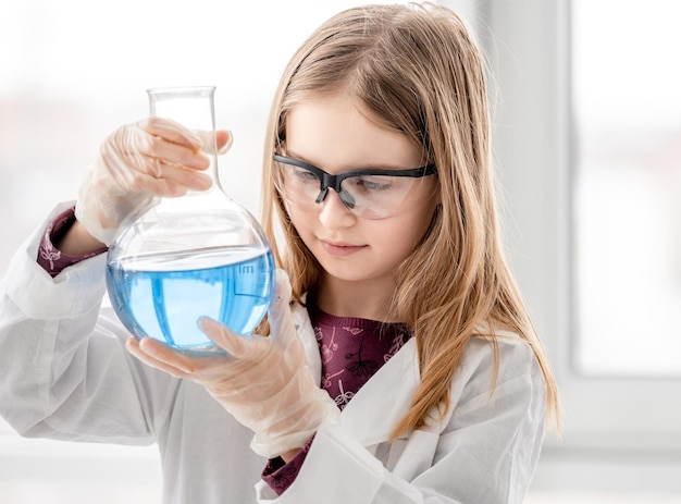 Girl on chemistry lesson