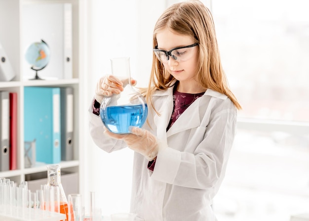 Girl on chemistry lesson