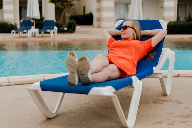 Girl on a deck chair