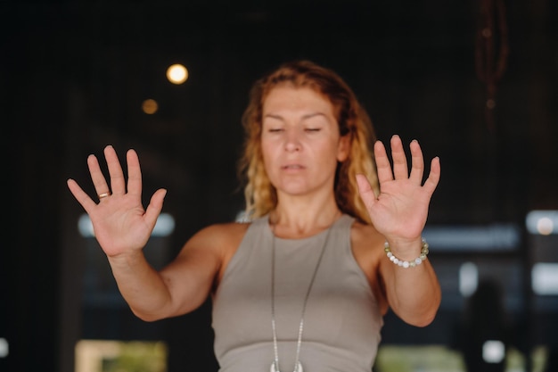 The girl does yoga and is in a state of meditation The concept of a healthy lifestyle