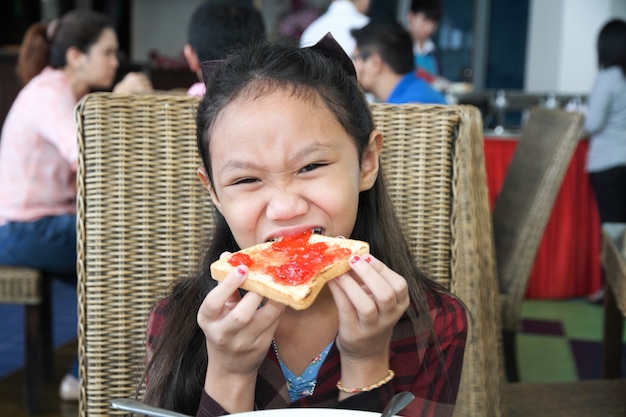 Girl eating breakfast