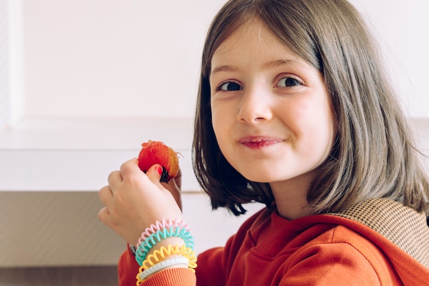 Girl enjoying breakfast at the kitchen