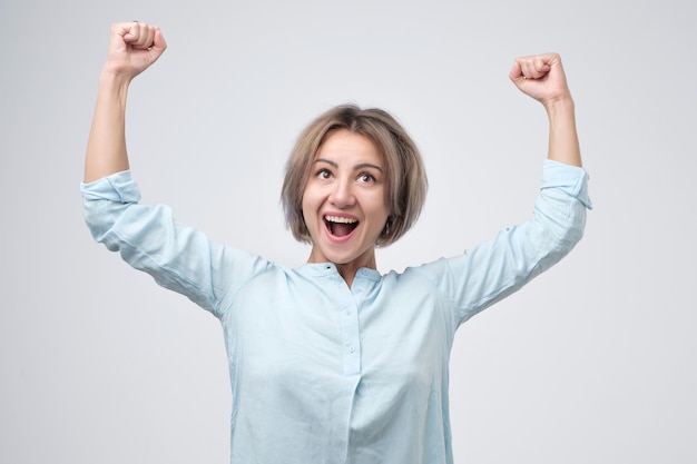 Girl feeling excited and happy after passing diffficult exam