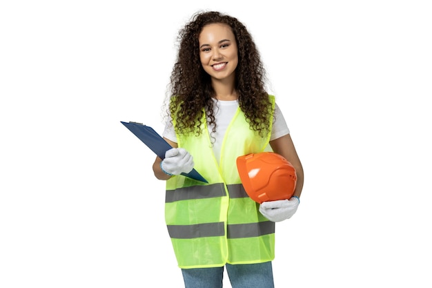 A girl in the form of a builder isolated on white background