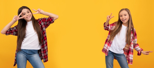 Girl friends happy teen girls in casual shirt having fun showing peace gesture on yellow background