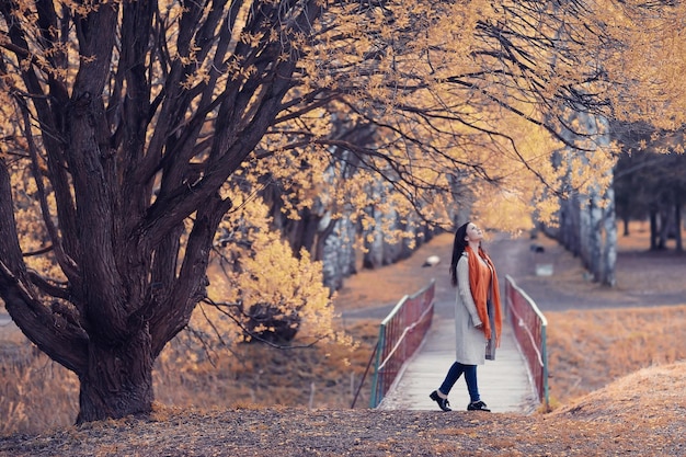 girl happy autumn park