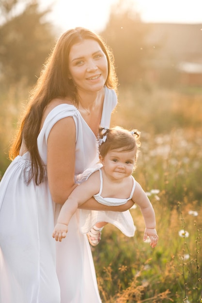 The girl and her mother are basking in the spring sunshine 3026