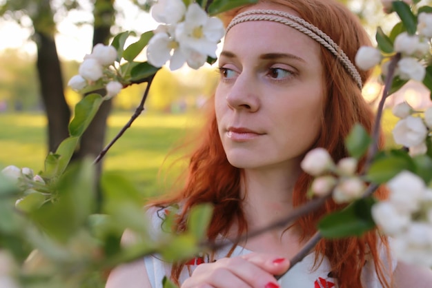 Girl hippie near tree