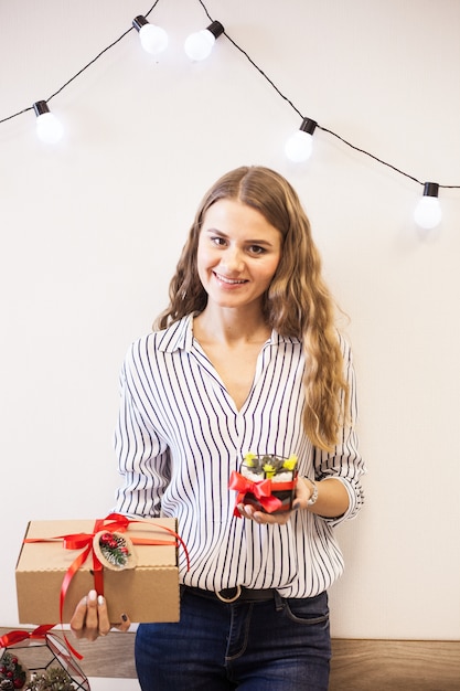 Girl holding Christmas gift, Christmas gift, decor item