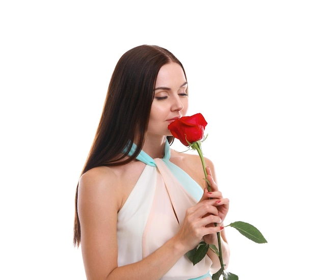 Girl holding red rose on white background