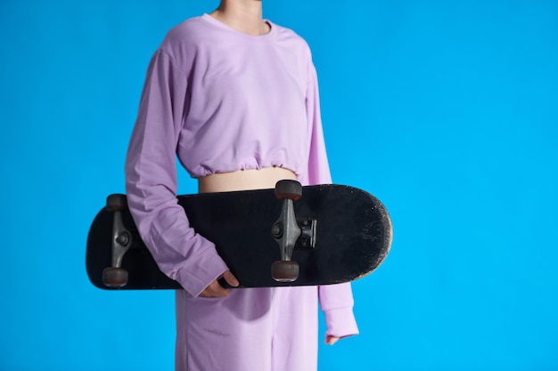 Girl Holding Skateboard