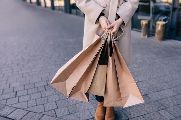 Girl holding their bags from the shop